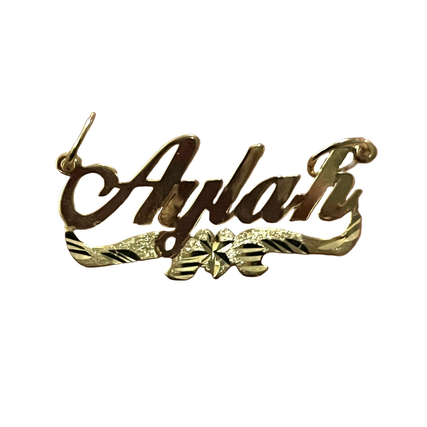 Gold nameplate with 'Aylah' engraved on a white background