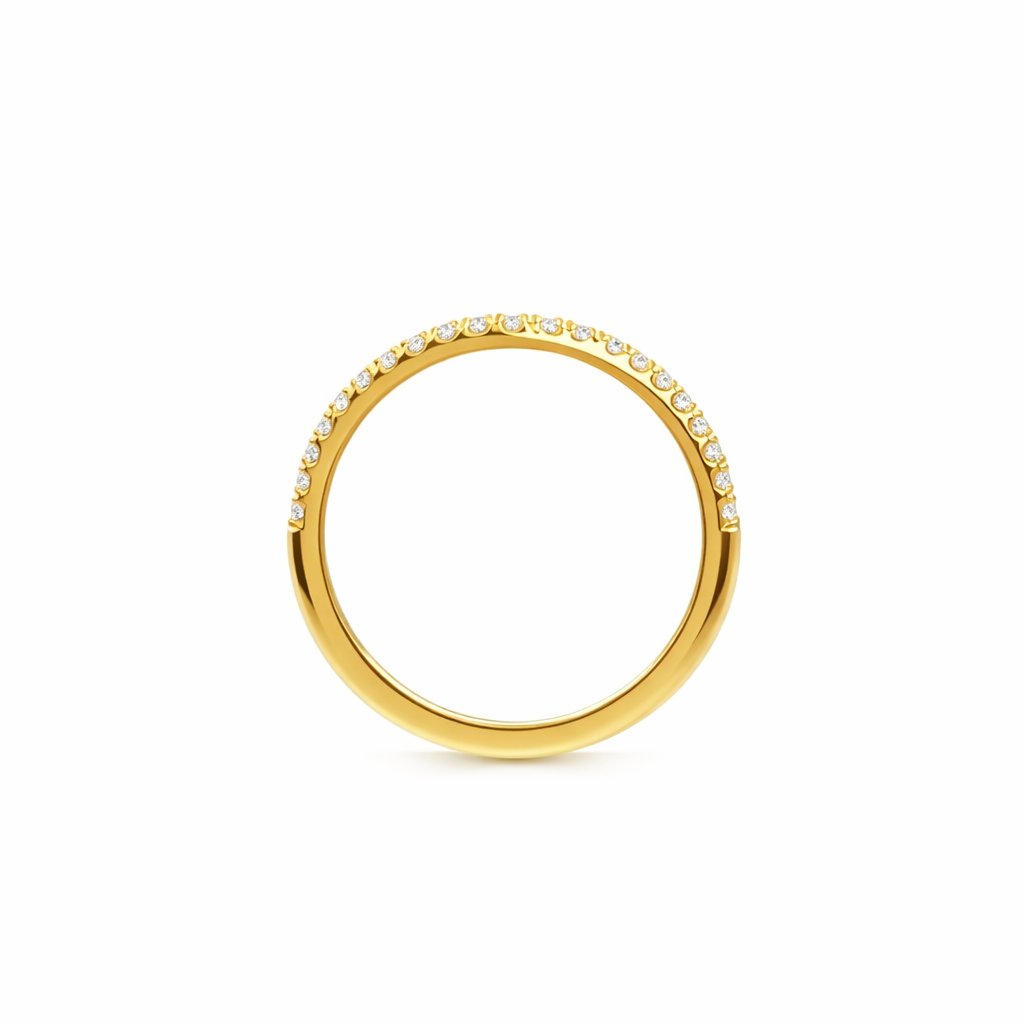 Gold ring with small diamonds on a white background
