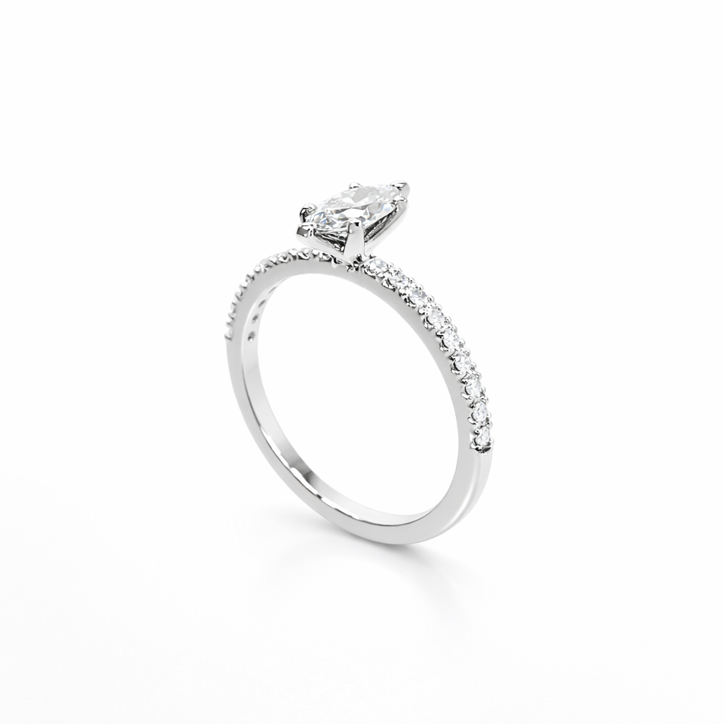 Silver ring with a diamond on a white background