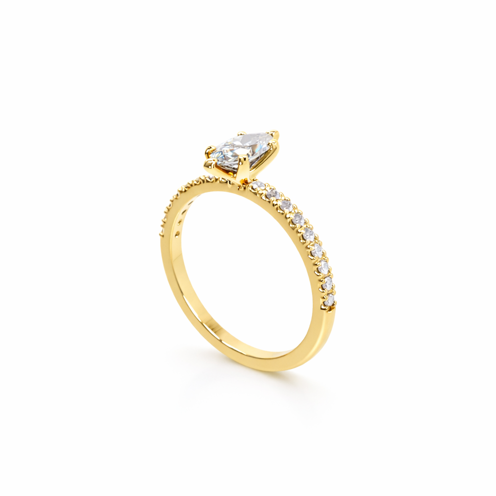 Gold ring with a diamond on a white background