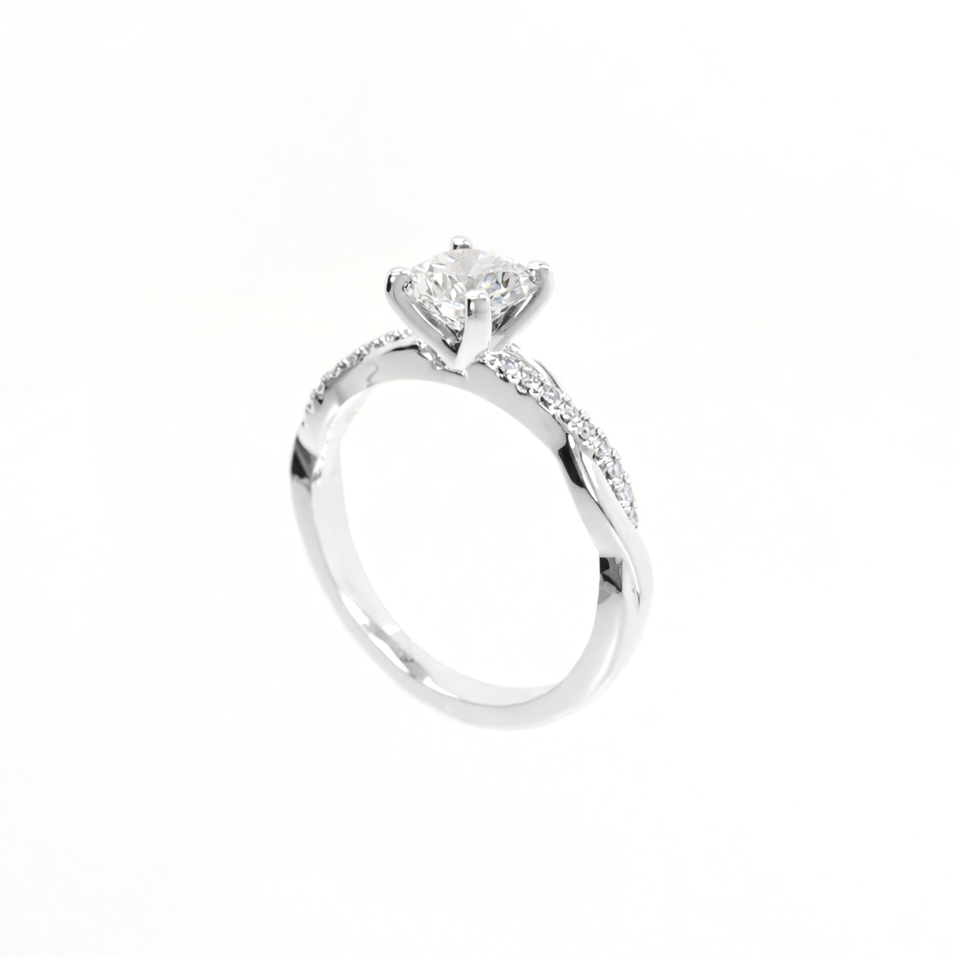 Silver ring with a diamond on a white background