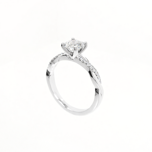 Silver ring with a diamond on a white background