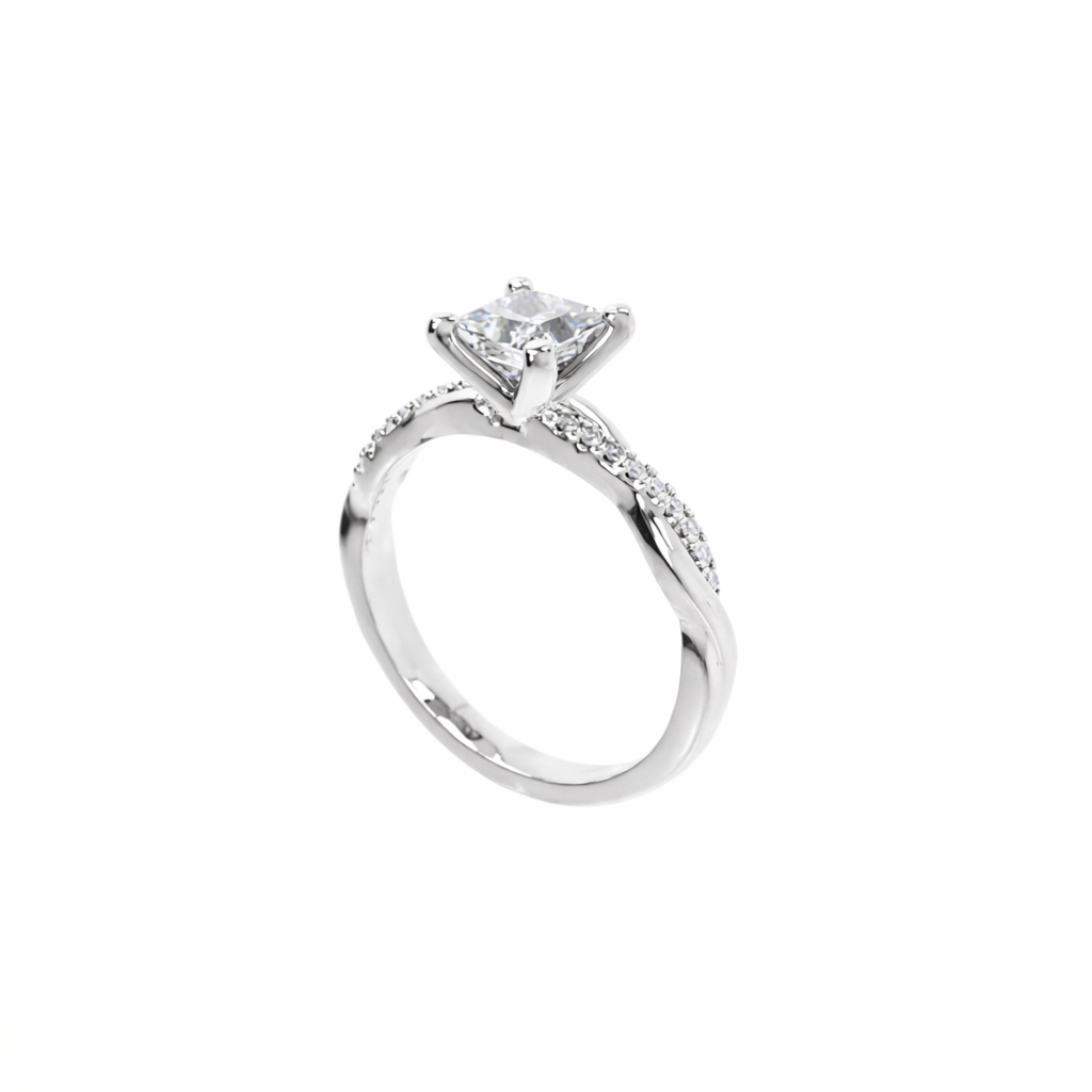 Silver ring with a diamond on a white background