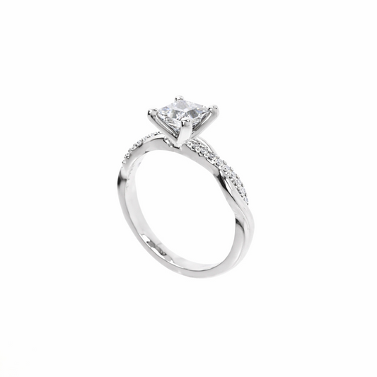 Silver ring with a diamond on a white background