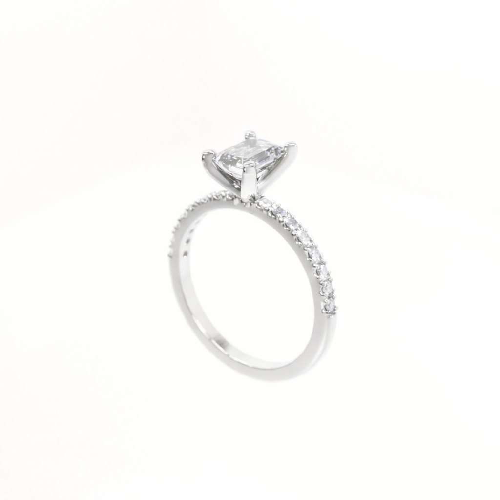 Diamond ring with a white gemstone on a white background