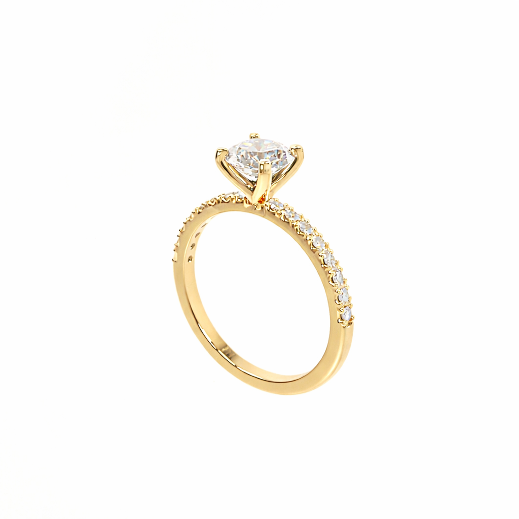 Gold ring with a heart-shaped diamond on a white background