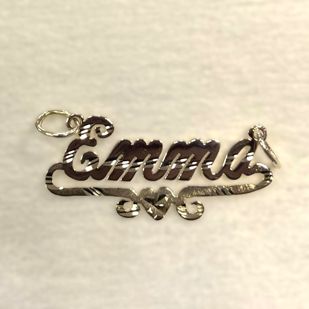 Silver name pendant with 'Emma' on a light beige background