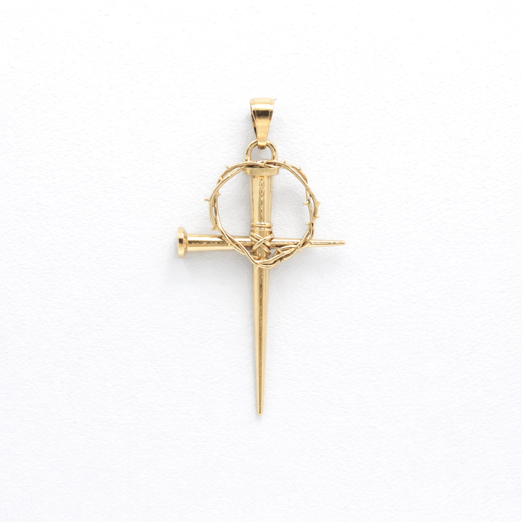 Gold pendant with a nail design on a white background