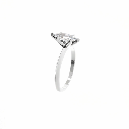Silver ring with a diamond on a white background