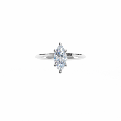 Marquise-shaped diamond ring on a white background