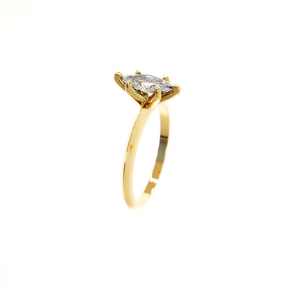 Gold ring with a diamond on a white background