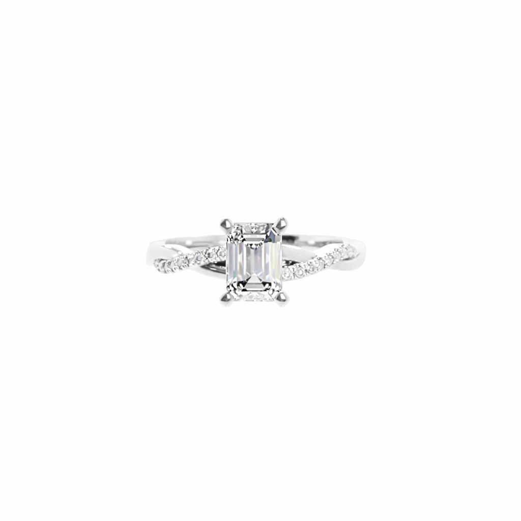 Gold heart-shaped ring on a white background