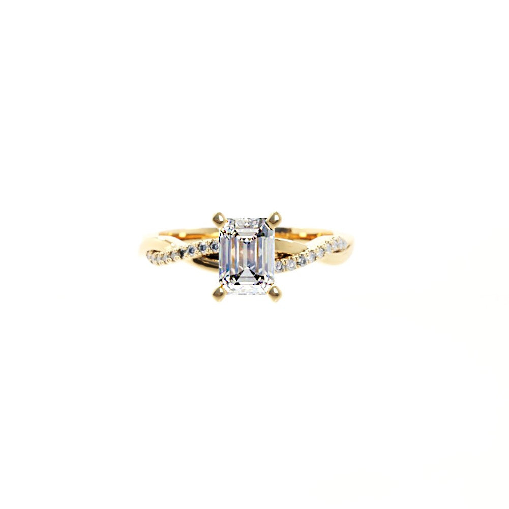 Gold ring with a diamond on a white background