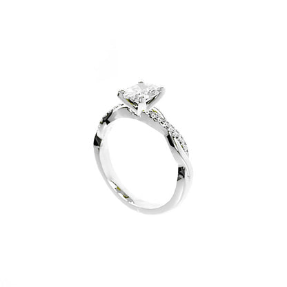 Silver ring with a diamond on a white background
