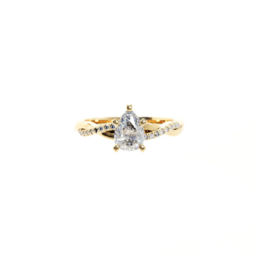 Gold ring with a diamond on a white background