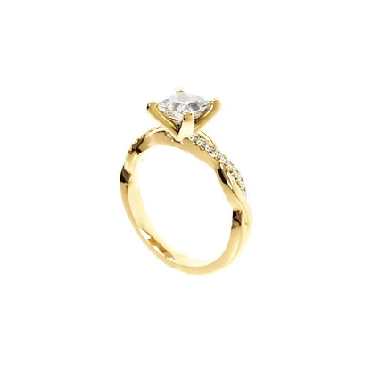 Gold ring with a diamond on a white background