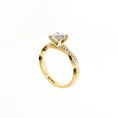 Gold ring with a diamond on a white background